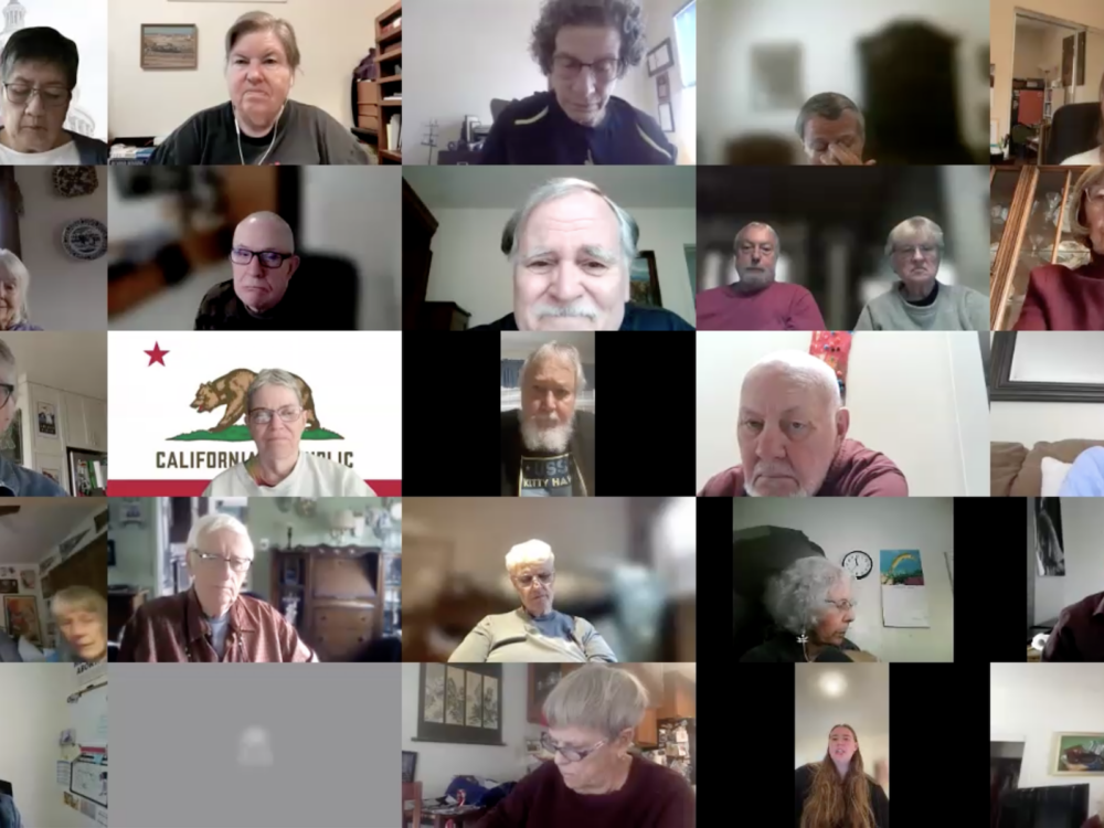 25 faces in square boxes on a screen