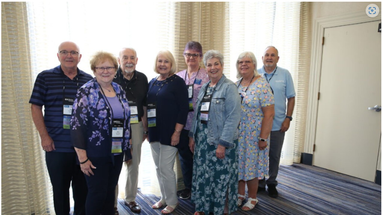 Eight members of NARFE Chapter 0011 standing for a photo