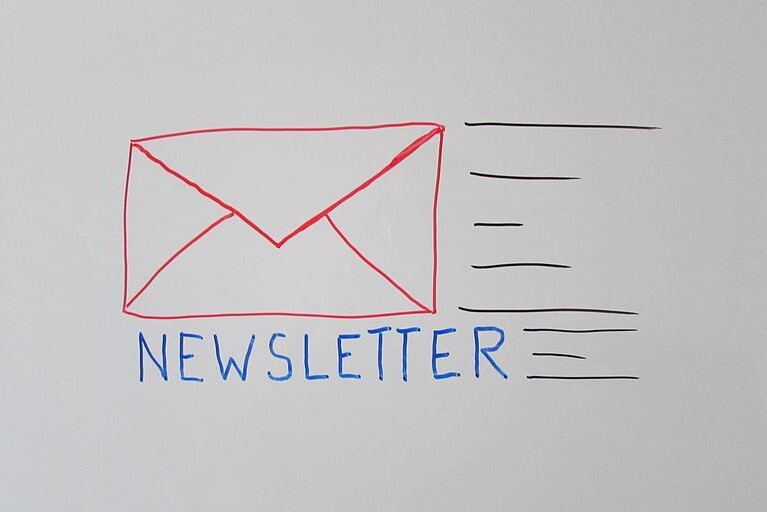 cartoon of an envelope and the word newsletter