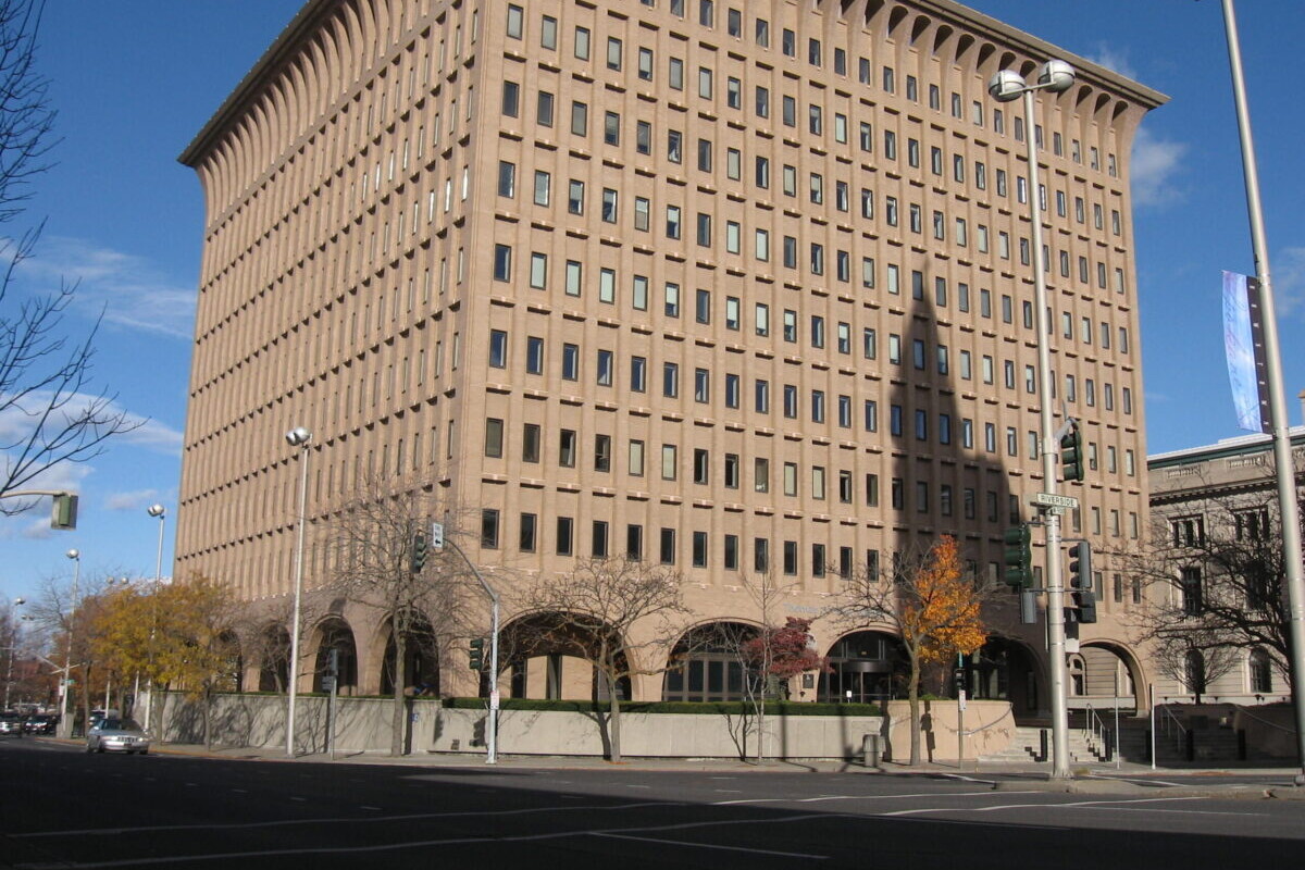 Street view of office building nine stories tall