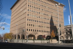 Street view of office building nine stories tall