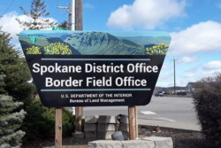 Sign publicizes Spokane District Office, Border Field Office