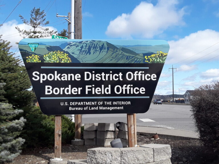 Sign publicizes Spokane District Office, Border Field Office