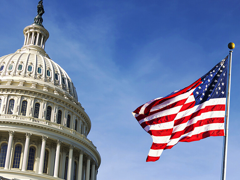 Capitol Building and flag flying