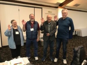 The installation of Chapter officers for 2024 (from L to R, Secretary Linda Wallers, Treasurer Jim Ellis, Vice-president Charlie Caughlan, and President Mike Teefy.)