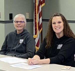Volunteer Sue Karr and Director of Community Relations