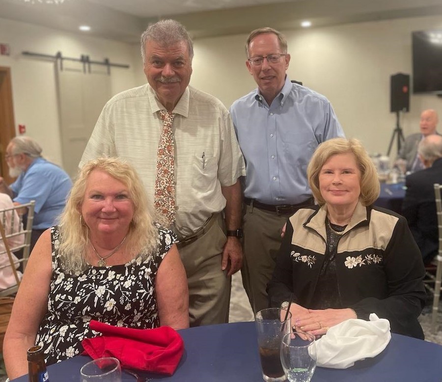 Picture four people from Lansing NARFE Chapter. Two seated and two standing behind them