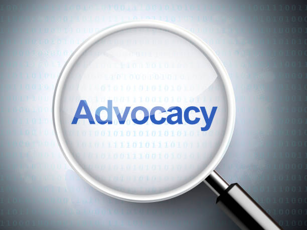 Picture of a magnifying glass with the word advocacy