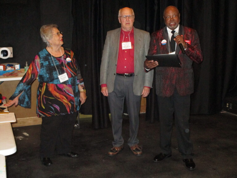 James Ploen, Conference host (center), receives an award from Texas Federation Secretary, Steven Johnson (right) as Dora Benavides, Texas Federation South Texas Area VP (left) looks on.