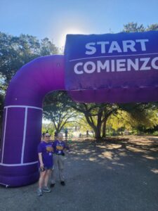 2025 Walk to End Alzheimer's members standing at the start and finish line
