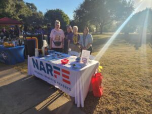 2025 Walk to End Alzheimer's Team Table with team members standing behind the table