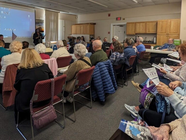 A photo of people attending the November health fair meeting.