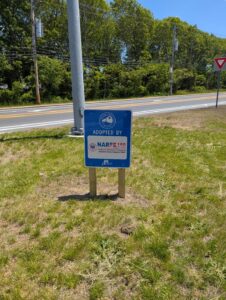 A picture of the Adopt A Spot sign