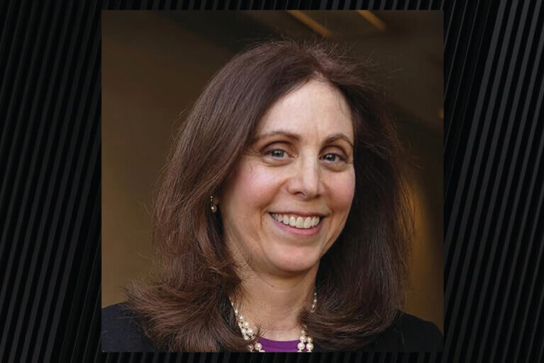 Headshot of a woman who is identified as Dr. Laura Kahn