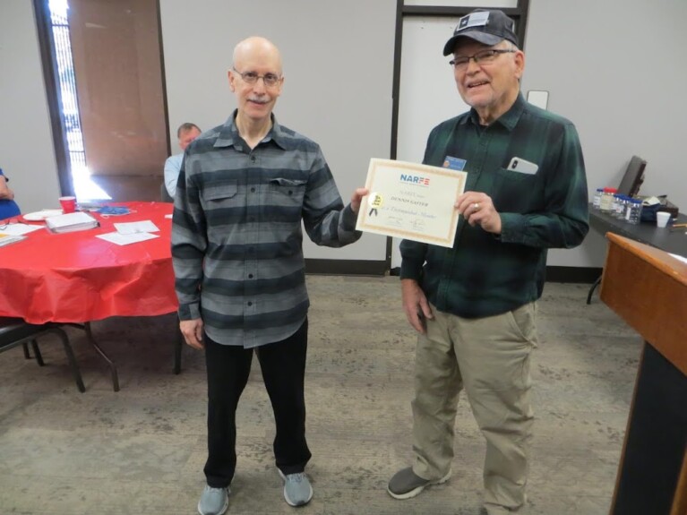 President of Chapter 1201 presenting a distinguished member certificate to one of our chapter members who also was a Chapter President