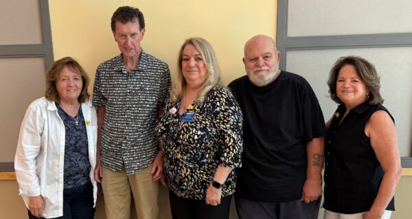 five chapter officers standing in front of wall.