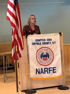 photo of women behind podium