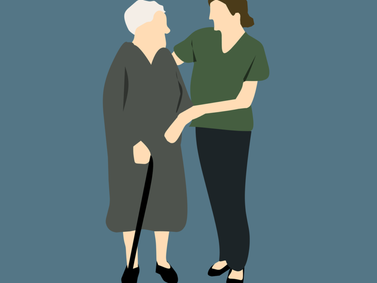 Nurse helping elder