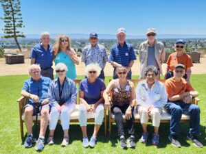 twelve members of NARFE Chapter 1494 pose for pictures in the sunshine after the July 2024 meeting at the Masonic Home in Union City