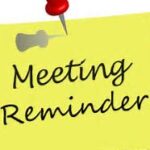Picture of a note with a red pin on top and the words Meeting Reminder written on it