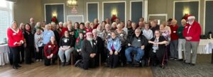 Picture of approximately 50 NARFE members at the Christmas party