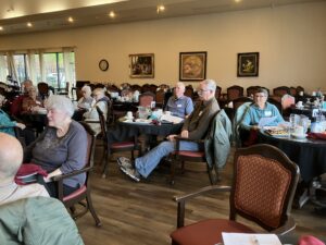 People sitting at lunch tables