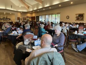 People sitting at lunch tables