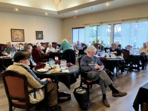 People sitting at lunch tables