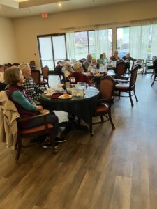 People sitting at lunch tables