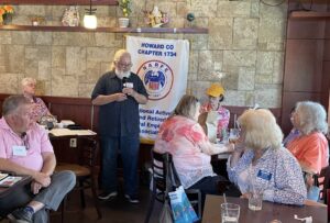 man speaking at restaurant