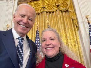U.S. President Joe Biden and Chapter 1734 of NARFE President Teresa Baker in the White House East Room.