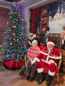 Christmas tree, woman and Santa