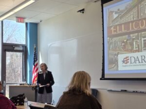 Woman in front of classroom