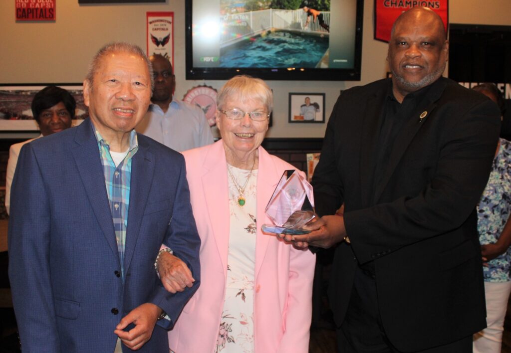 Frank Lee, left, accepts Chapter award for service as Chapter President from Maryland Federation President, Gary Roundtree