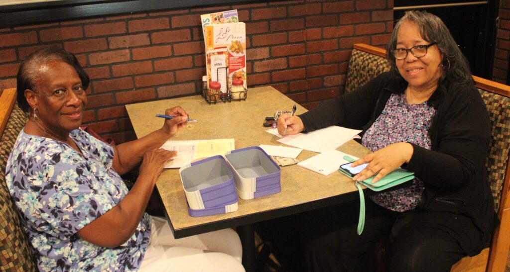 At the Ledo's Pizza Luncheon, from left, Assistant Treasurer Louise Cole and Treasurer Vanessa Washington