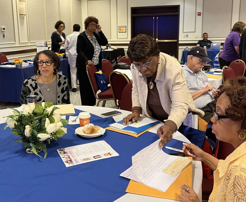 Chapter members Rhonda Hackley and Lillie Watson Serving as Conference Registration Team