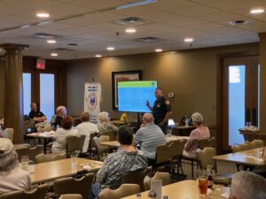 Montgomery County Sheriff Rob Streck briefs audience on senior scams shortly before he was called away for quadruple homicide August 2022