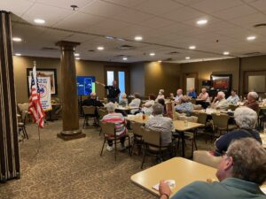 Montgomery County Sheriff Rob Streck briefs audience on senior scams shortly before he was called away for quadruple homicide August 2022