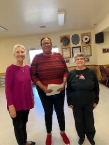 Two people who are new Chapter 2031 officers sworn in by a Federation Officer