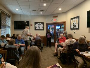 AETNA Health Insurance representative gives updates to Chapter members.