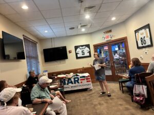 Guest speaker Sharon Vasickanin provides information regarding Project Linus to chapter members.