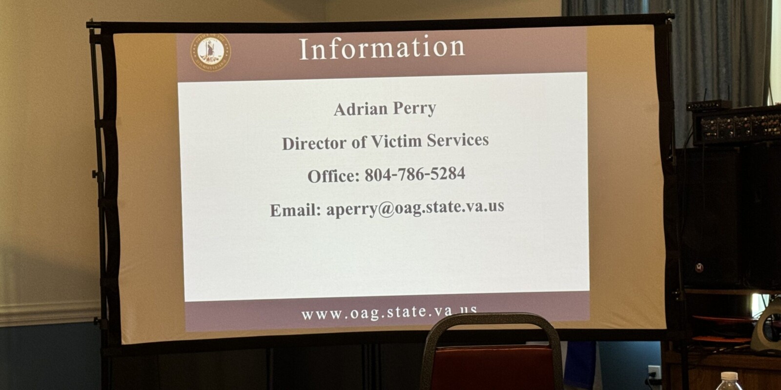 Slie giving information on how to contact the speaker