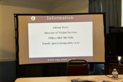 Slie giving information on how to contact the speaker