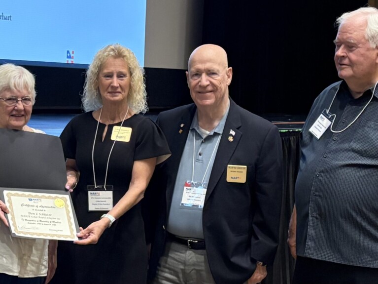 Recruiting Award for Don Schulter being accepted by with RVP V Linda Sawvell, National President Bill Shackelford, and Iowa President Dorman Otte presenting