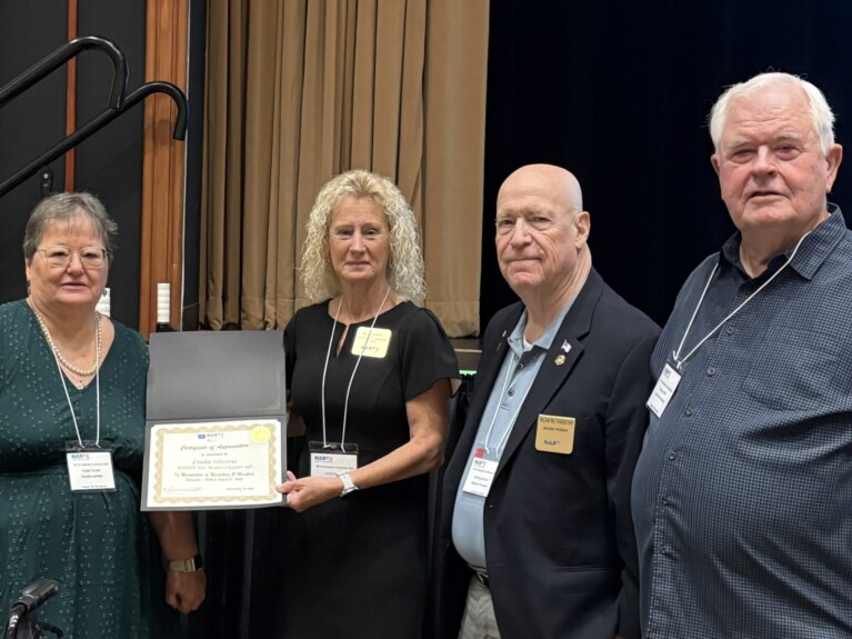 Recruiting Award for Linda Silverio with RVP V Linda Sawvell, National President Bill Shackelford, and Iowa President Dorman Otte presenting