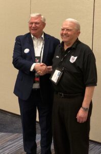 two men shaking hands