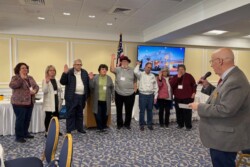 Picture of National President swearing in new officers of the KY Federation
