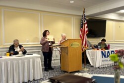 Picture of Federation Secretary receiving award