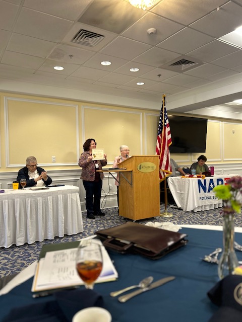 Picture of Federation Secretary receiving award