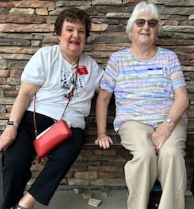 Picture of two women sitting on a bench